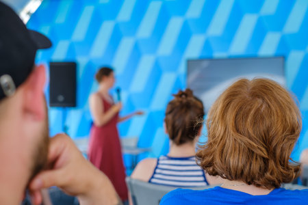 Viewers during presentation of blurred woman