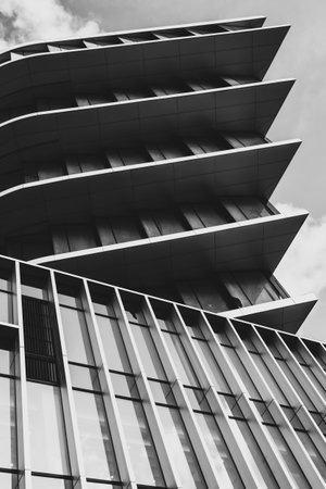 Abstract urban photography of a layered building facade in black and white colorsの写真素材
