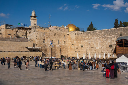 Jerusalem, Israel - November 22, 2023: People at the Western Wall with the Dome of the Rock in the background, a sunny day in Jerusalem.のeditorial素材