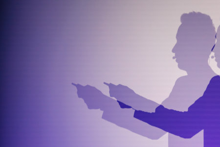 Abstract silhouette of a person speaking or presenting, depicted in soft purple tones for creative concept.の写真素材