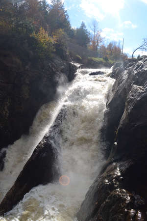 Waterfall with striking sun