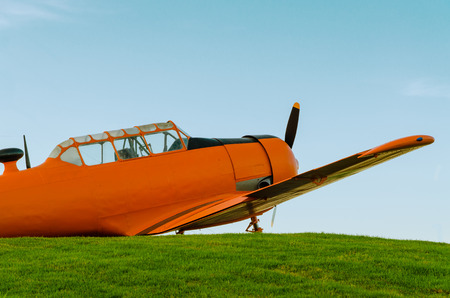 Adventure in the sky, Old airplane, orange, North American T-6G Texanの写真素材