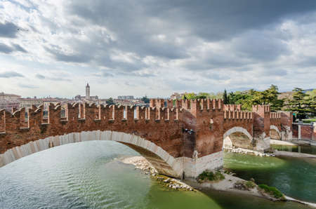 Castelvecchio bridge and fortress Adige river Veneto Italyのeditorial素材