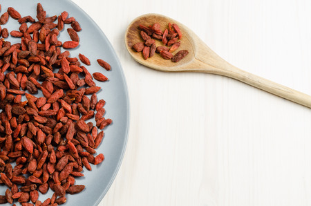 Goji berry dried, with spoon.の写真素材