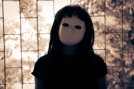 Scary ghost woman wearing white mask in Haunted House, Horror backgroundの写真素材