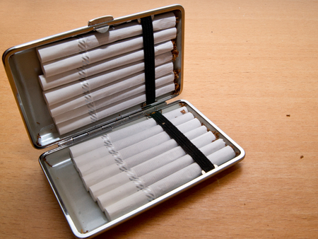 The filled cigarette in the tray is loaded.の写真素材