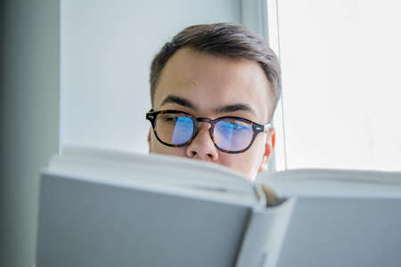 man reading a bookの写真素材