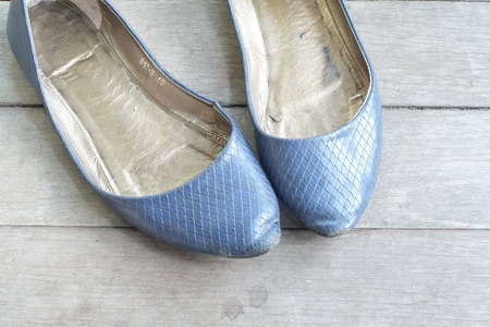 ladies shoes on woodenの写真素材