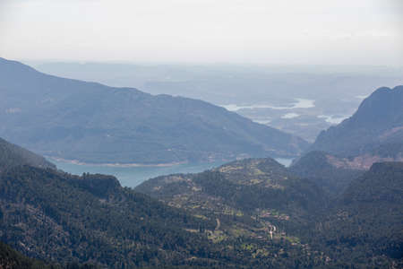 Rivers between mountains top view. Streaming blue river