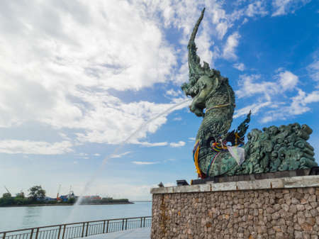 The Great Serpent "Nag" at Songkla,Thailand blow water to the seaのeditorial素材
