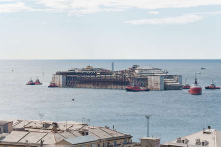Costa Concordia wreck enters Genoa port for scrapping on 27 July 2014   の写真素材