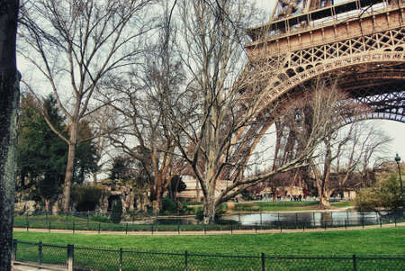 Gardens with a pond under the Eiffel Tower の写真素材