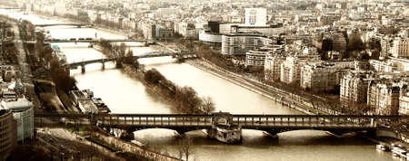 View from the Eiffel tower bridge Bir-Hakein and islet on the river Seine with the reply of the Statue of Liberty の写真素材