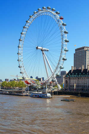 The Ferris wheel in London  The London Eye, reflected on the River Thames のeditorial素材