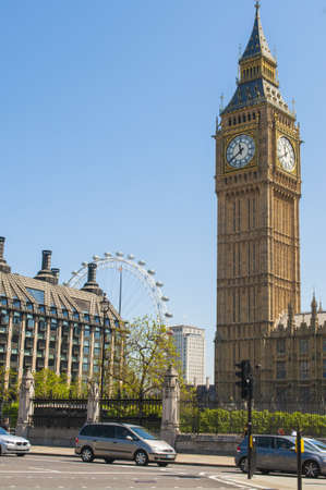 The clock tower of London, Big Ben and the London Eye in the background のeditorial素材