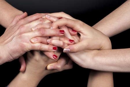 Tangle of hands の写真素材