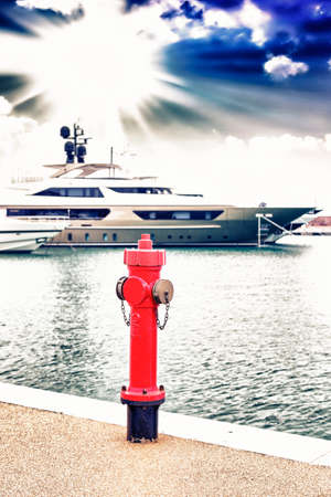 Hydrant fire in the harbor.の写真素材