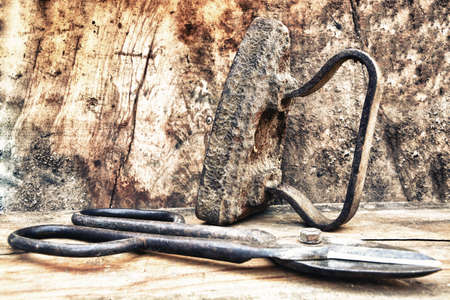 Old tools: Flatiron and pruning shears.の写真素材