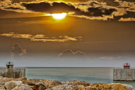 Entrance of harbor with beautiful sky.の写真素材