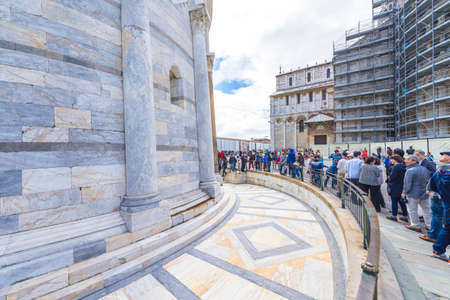 PISA, APRIL 30: Many people waiting to enter the Tower , April 30, 2014 in PIsa. Leaning Tower and Baptistery and Dome are a Unesco World Heritage site.のeditorial素材