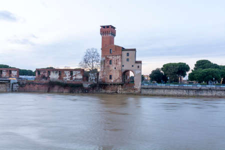 Old building near the river Arno.の写真素材