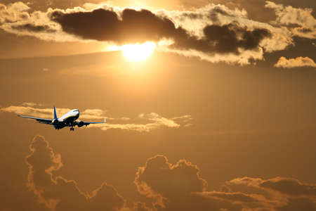Silhouette of airplane with a beautiful sky.の写真素材