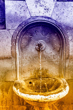 Old fountain in Rome.の写真素材