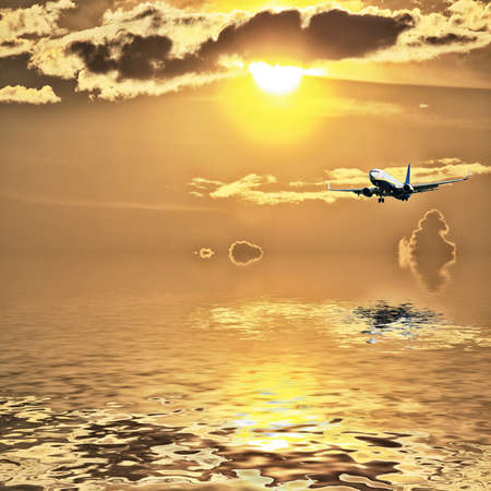Silhouette of airplane with a beautiful sky.の写真素材