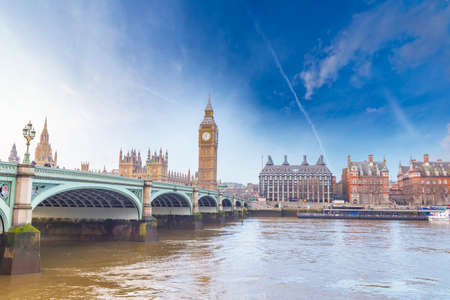 Big Ben and Houses of Parliament with bridge and thames river in London.のeditorial素材
