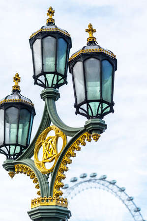 London - January 15, 2015: An ornate lamp post on Westminster Bridge January 15, 2015 in London. Milions of tourists visit London every year.のeditorial素材