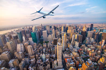 Plane over Manhattan, NYC.のeditorial素材