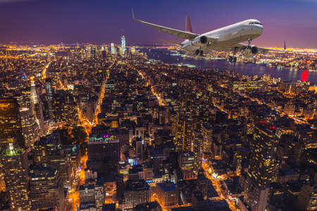 Airplane over Manhattan.の写真素材
