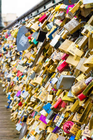 Locks on a bridge in Paris symbolize eternal love.のeditorial素材