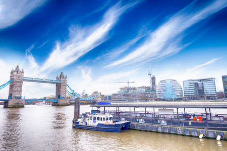 Tower Bridge and London skyline.