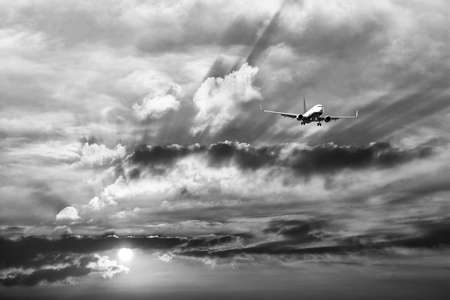 Airplane during landing with beautiful sky.の写真素材