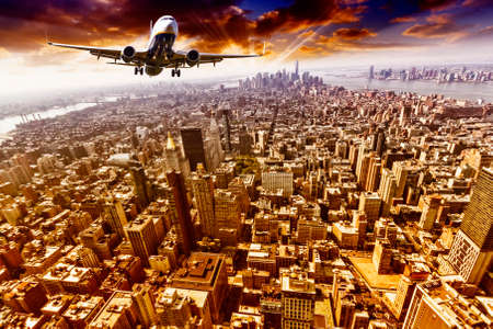Airplane over Manhattan, NYC.の写真素材