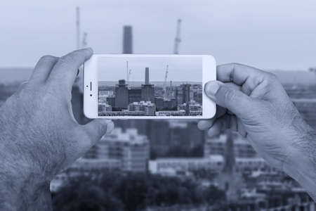 Skyline of London on smartphone.の写真素材