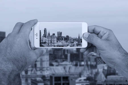 Skyline of London on smartphone.の写真素材