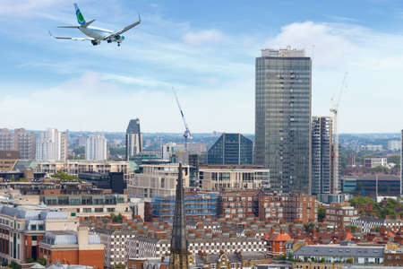 Airplane over London.の写真素材