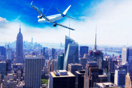 Airplane over Manhattan, NYC.の写真素材