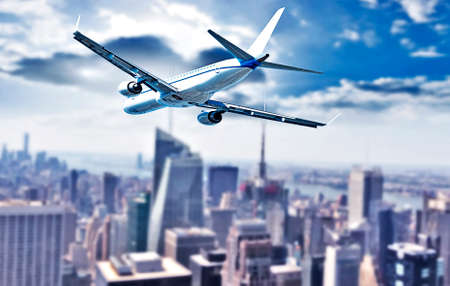 Airplane over Manhattan, NYC.の写真素材