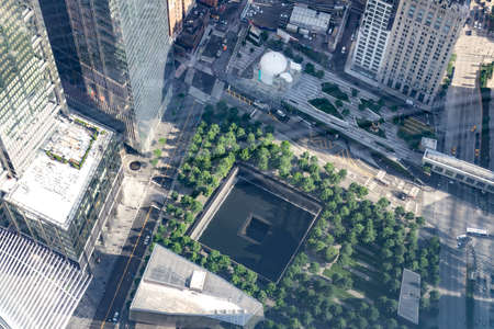 New York City - June 16, 2018: Aerial view over the September 11th memorial in downtown Manhattan....