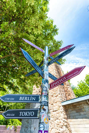 Road pole with City indications.の写真素材