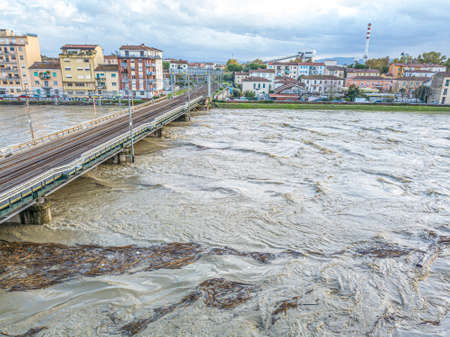Details fo train's bridge with swallen river, Pisa, Italy.の写真素材