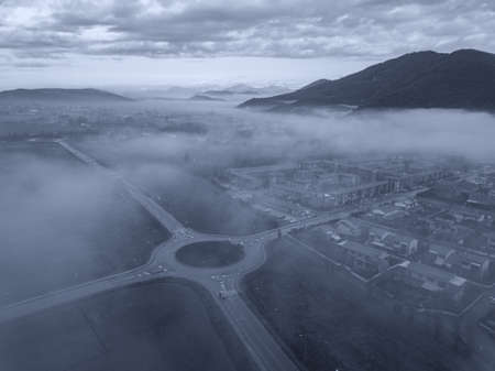 Aerial view street in the fog, Tuscany.の写真素材