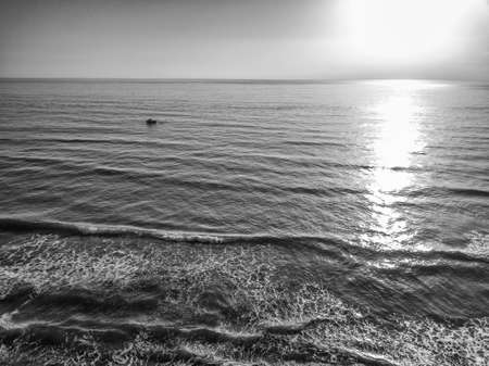 Aerial view of sunset over the sea photos taken by the drone.の写真素材