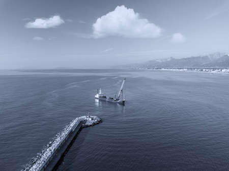 Aerial view from the drone of a dredging vessel seabed.の写真素材
