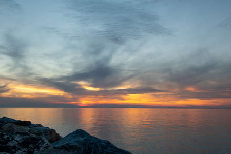 Beautiful sunset over the sea, Tuscany, Italy.の写真素材