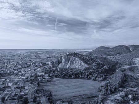 Aerial view from drone of a small village on hill in Tuscany.の写真素材