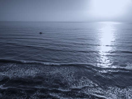 Aerial view of sunset over the sea photos taken by the drone.の写真素材